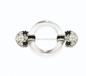Broche CARTIER, Cristal de Roche, Diamants, Onyx et Platine 1922 © Sotheby's