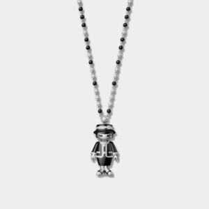 Necklace watch coco-black jacket © CHANEL
