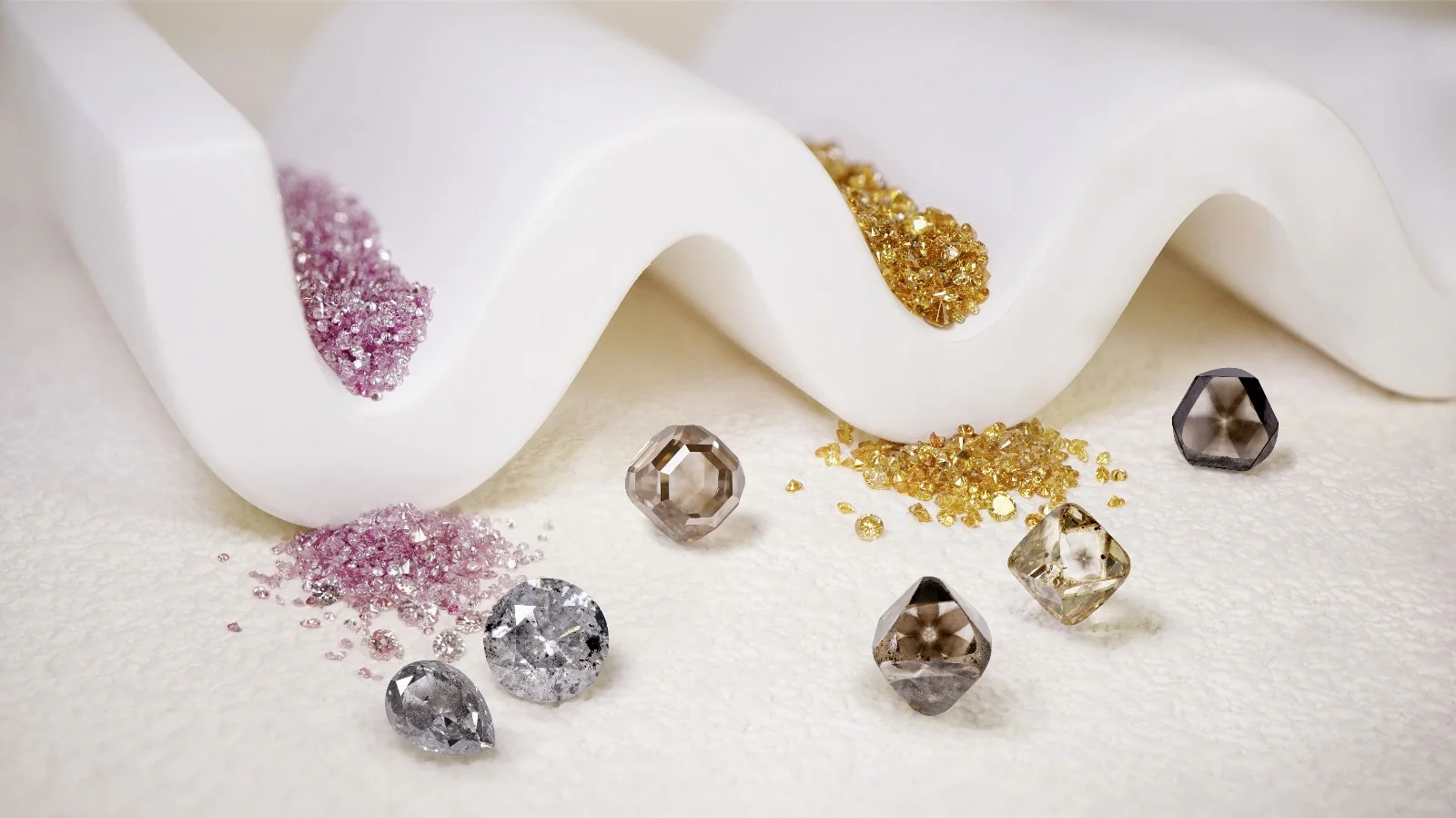 Star Inclusion Diamonds,Natural Fancy Color Melee and Salt and pepper DIamonds © Dynamic International