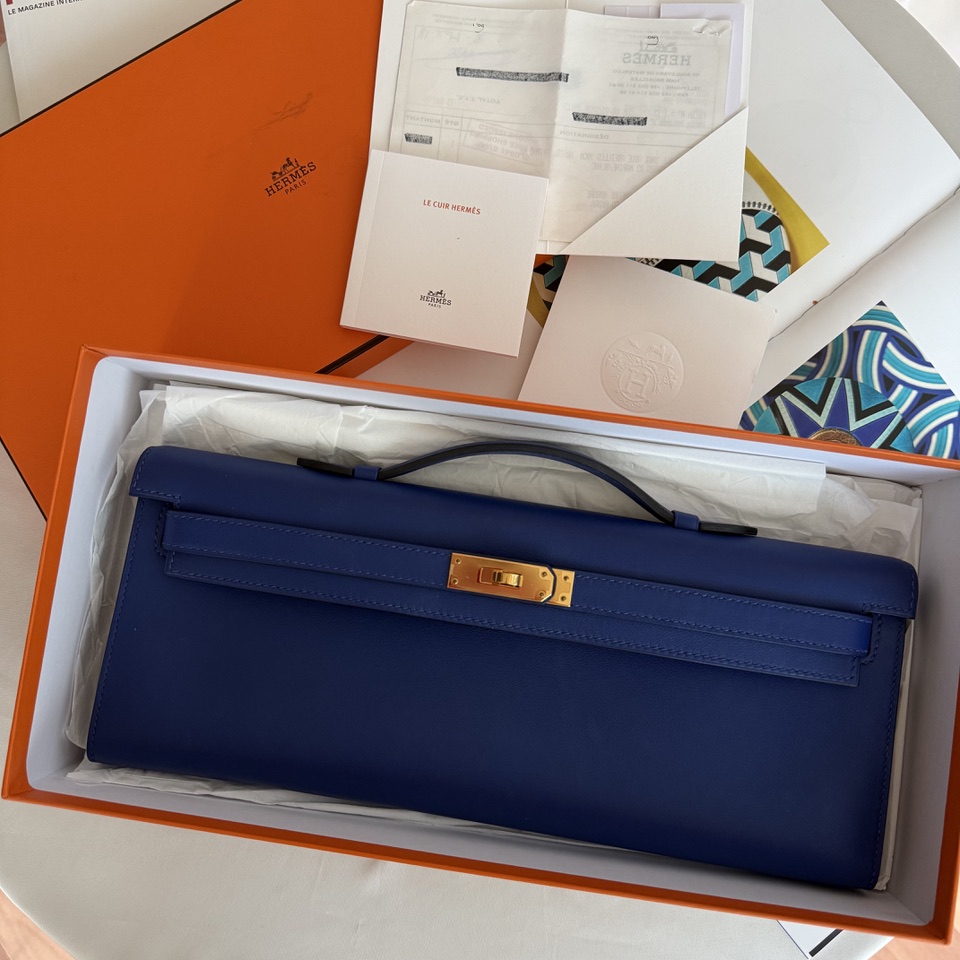 Sac Hermès bleu dans sa boite Hermès orange